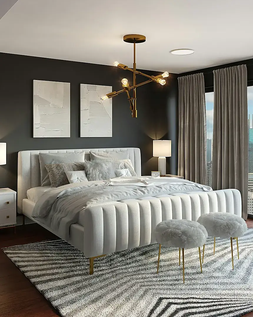 Bedroom with a dark grey wardrobe and upholstered furniture