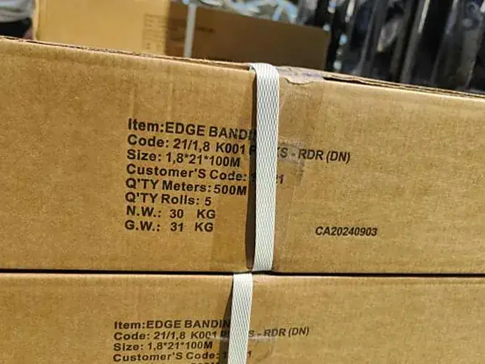 Printed carton of edge banding showing product code and roll dimensions